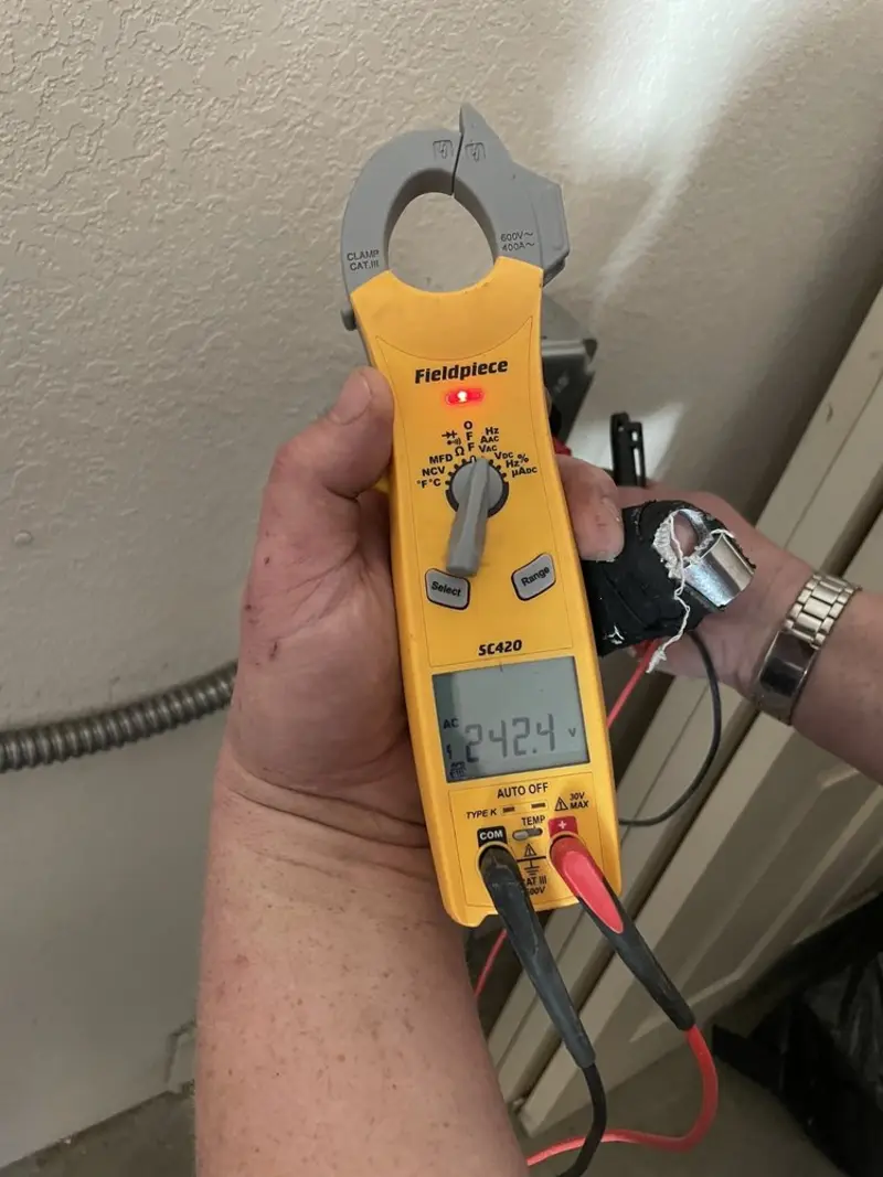 Voltage testing with clamp meter during Generator Installation in Marblehead